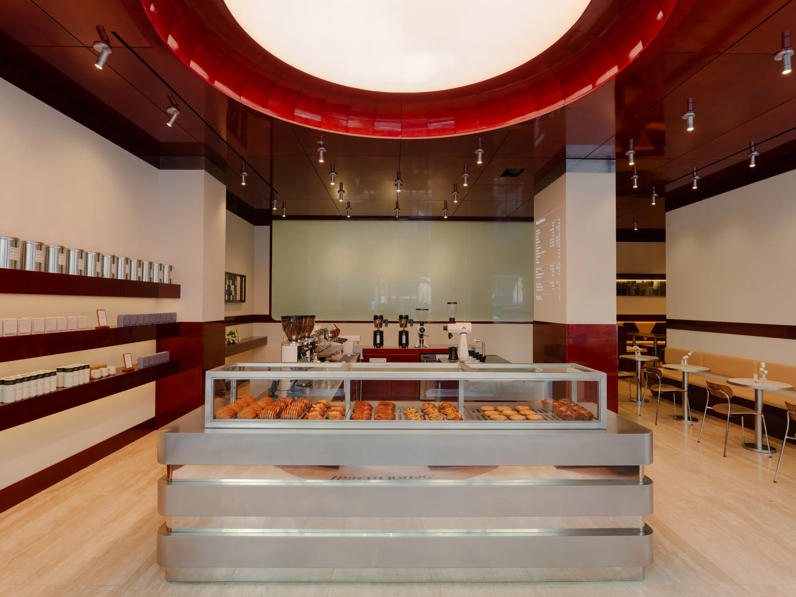 WatchHouse Chrysler cafe counter beneath a circular illuminated ceiling